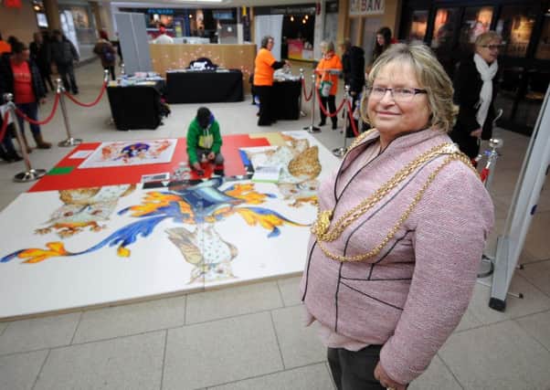 Lord Mayor of Leeds councillor Judith Chapman in front of the Leeds Lego Crest. Picture by Simon Hulme.