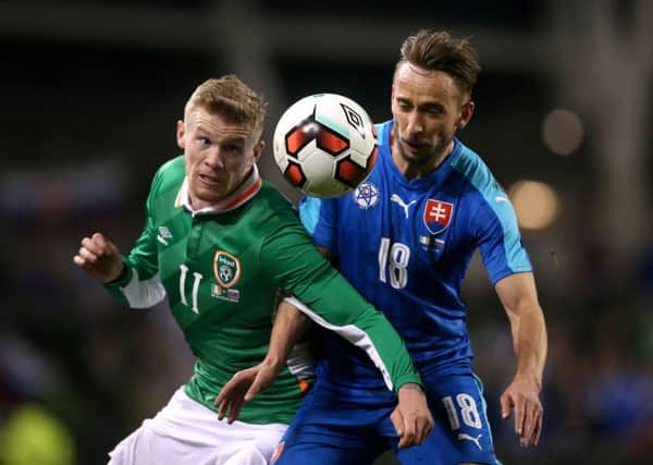 Republic of Ireland's James McClean and Slovakia's Dusan Svento (right) battle for the ball. PIC: PA