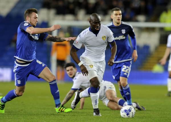Souleymane Doukara charges away from Joe Ralls and Stuart O'Keefe.  Picture: Bruce Rollinson.