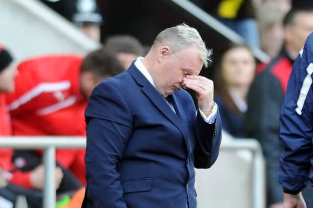 PAINFUL: Steve Evans shows his frustration as Leeds United concede a last-minute penalty at Rotherham United. Picture by Tony Johnson.