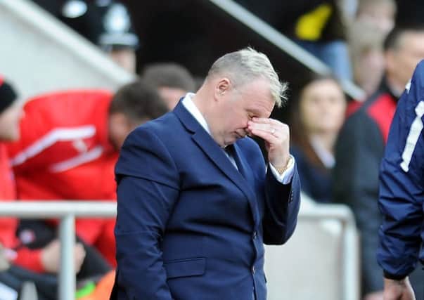 PAINFUL: Steve Evans shows his frustration as Leeds United concede a last-minute penalty at Rotherham United. Picture by Tony Johnson.