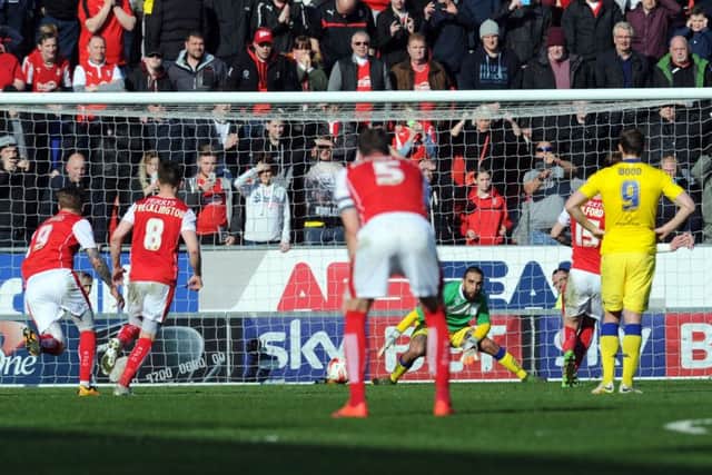 Rotherham's Greg Halford scores a penalty past Leeds sub keeper Giuseppe Bellusci. PIC: Tony Johnson