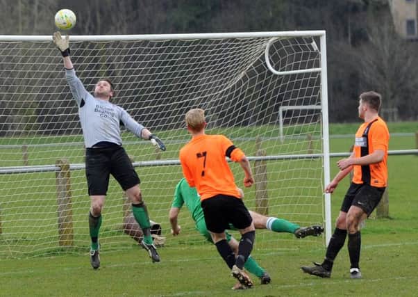 Fingertip save from Andy Caine in the Wetherby goal