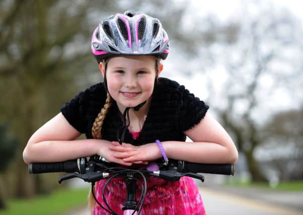 Nine-year-old Harriet Williams from Horsforth, who has raised Â£3,500 so far in memory of her dad Hylton