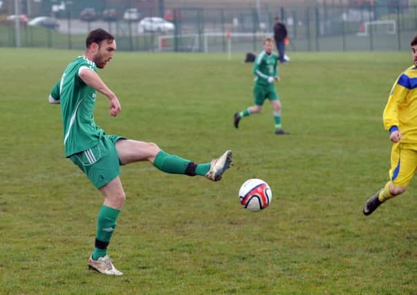 Four-goal Dominic Simpson in action for St John Fisher Res v Ravenswharfe in the Heavy Woollen League. PIC: Steve Riding