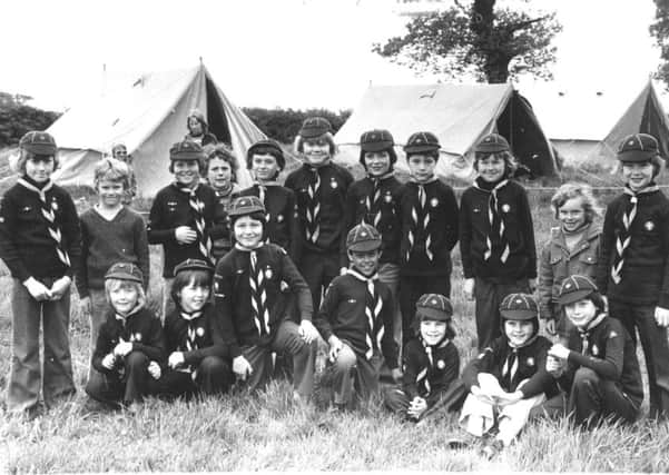 MAY 1975: 

Boys of the 10th Leeds (Halton Templars) Cub pack seen in camp at Yew Tree Farm, Colton near Leeds, where they spent four days during the Spring Bank Holiday.