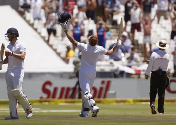 England's Jonny Bairstow, centre, reacts after making his debut Test century in South Africa this winter. Picture: AP