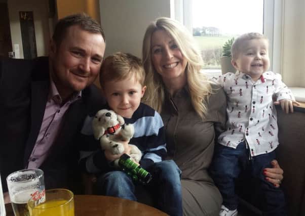 Phil and Emma McDonald with sons Louie, 5, and Freddie, 3, (right).