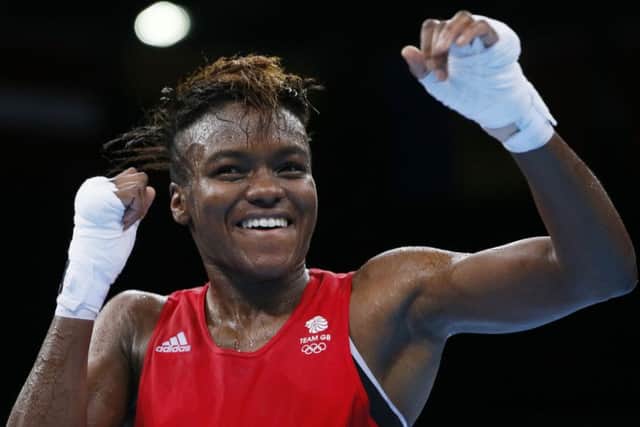 Nicola Adams celebrates her victory over Sandra Drabik of Poland in the women's fly boxing final at the 2015 European Games in Baku. (AP Photo/Dmitry Lovetsky)