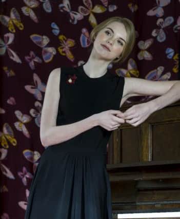 You want a brooch, said Mrs. Fairfax. I had a single little pearl ornament which Miss Temple gave me as a parting keepsake.Black lace pleat dress, Â£55; black flat slip-ons, Â£30; pearl brooch, stylists own.