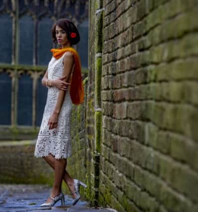 "Miss Ingram was certainly the queen." Ivory leaf lace dress, Â£75; orange chiffon shawl, stylists own; silver sequin high heel shoes, Â£30; coral flowers for hair, stylists own.
