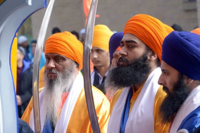 Sikhs from the Gurdwara Temple in Chapeltown at the Vaisakhi parade in Leeds. Pics: Gary Longbottom.