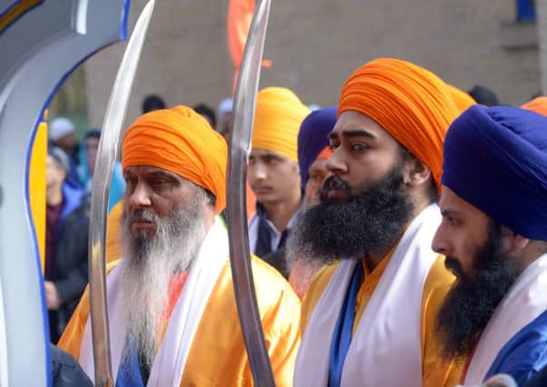 Sikhs from the Gurdwara Temple in Chapeltown at the Vaisakhi parade in Leeds. Pics: Gary Longbottom.