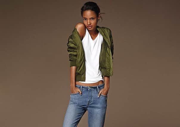 Bomber jacket, Â£55; jeans from a selection, at Topshop.
