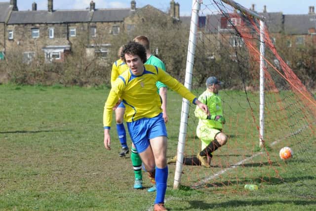 Four-goal Christy Woods celebrates his hat trick goal for Woodkirk Valley against Premier Division rivals Chickenley. PIC: Steve Riding