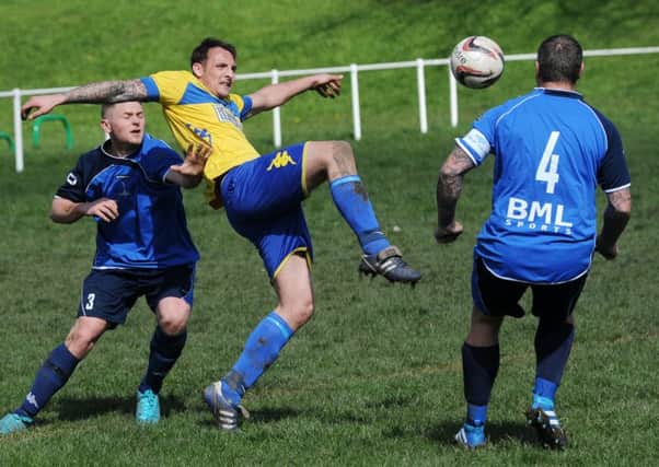 Jordan Webb, of West Leeds Wortley, flicks the ball goalwards in the President's Cup clash with West Leeds Armley. PIC: Steve Riding