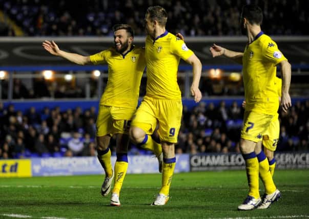 Stuart Dallas celebrates his second goal with Chris Wood and Lewis Cook.
 (Picture: Bruce Rollinson)