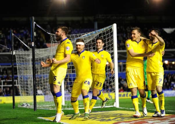 Stuart Dallas celebrates his second goal in front of the travelling Leeds fans.