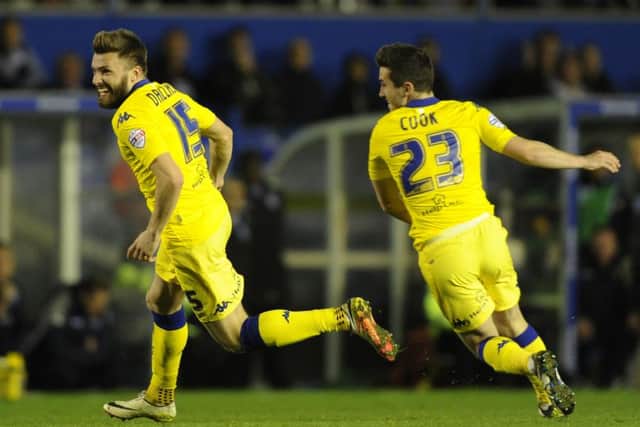 Stuart Dallas celebrates with Lewis Cook after scoring his second goal against
Birmingham City.