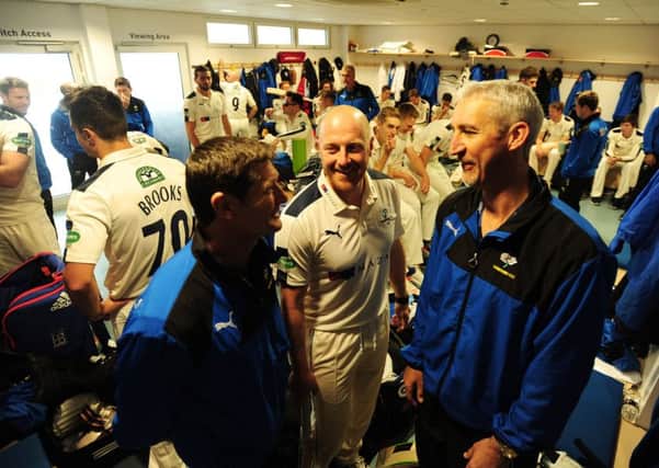 STEPPING OUT: Captain Andrew Gale chats to director of cricket Martyn Moxon, left, and coach Jason Gillespie in the dressing room on Friday.  Picture: Simon Wilkinson
