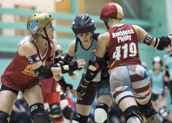 Leeds' roller derby team Hot Wheel take on Middlesbrough Milk Rollers this Saturday. The two teams are pictured during a previous clash. Picture: Jason Ruffell.