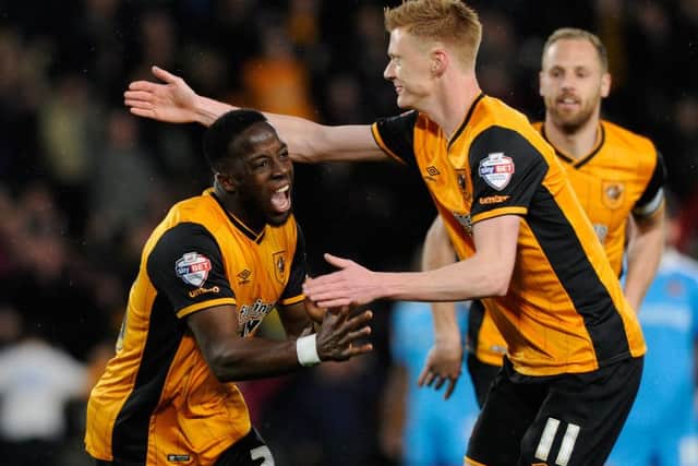Adama Diomande celebrates his opening goal against Wolves with Sam Clucas . Picture: Bruce Rollinson.