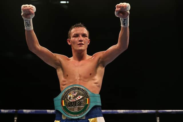 Josh Warrington celebrates his victory over Hisashi Amagasa at the First Direct Arena. Picture: Simon Cooper/PA.