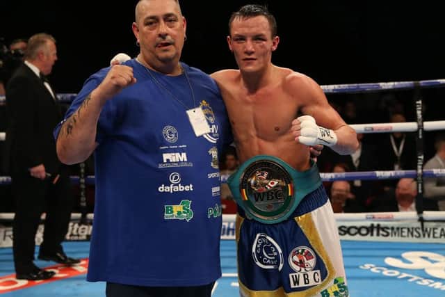 Josh Warrington celebrates his victory over Hisashi Amagasa at First Direct Arena, Leeds. Picture: Simon Cooper/PA.