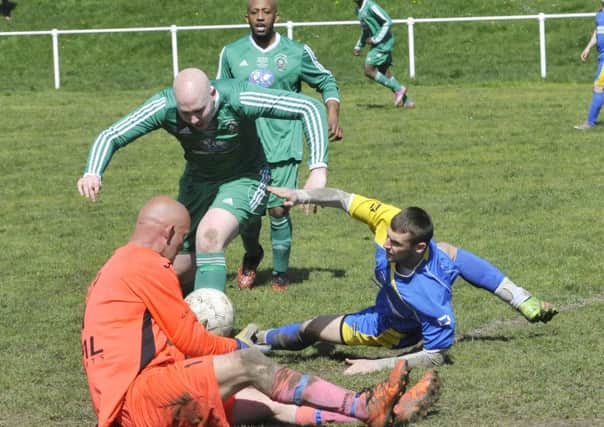 Goalmouth action between Chapeltown Fforde Grene and West Leeds Farnley. PIC: Steve Riding