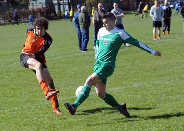 Action from St John Fisher OB v Woodkirk Valley in the Heavy Woollen League Premier Division. PIC: Steve Riding