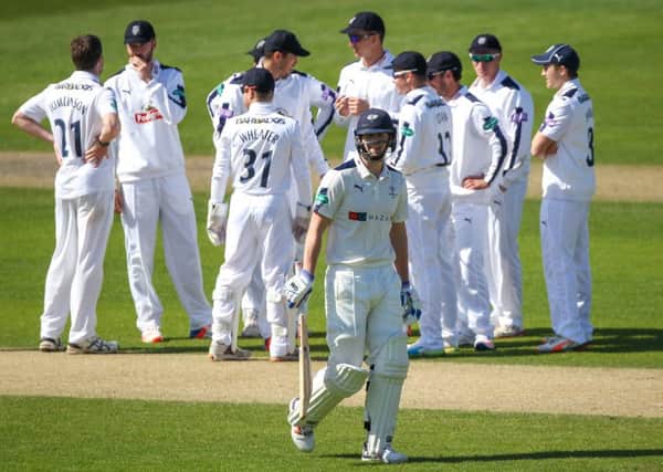 Yorkshire's Alex Lees walks off dejected as he is dismissed by Hampshire's James Tomlinson.