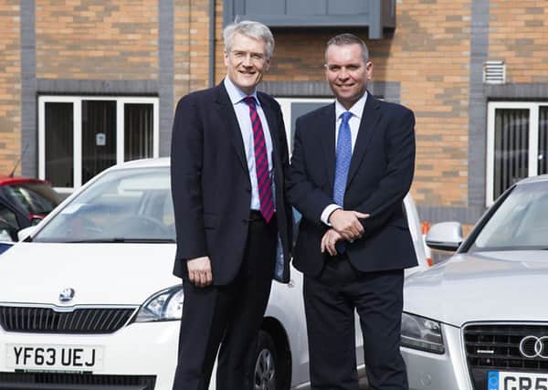 Neil Addley, Managing Director of Trusted Dealers and Andrew Jones MP, Parliamentary Under Secretary of State for Transport, left.
Picture: Sam Oakes.