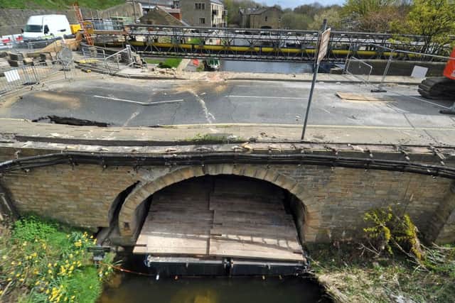 Engineers  remove stonework as part of works to dismantle Elland Bridge over the Calder & Hebble Navigation in Elland which was damaged by the Boxing Day floods. Picture: Tony Johnson