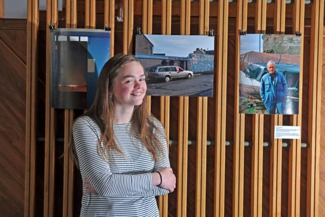 Student Lizzie Liddington with her photographic work on the Scottish fishing industry.    Picture Tony Johnson