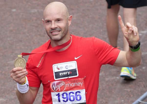 Former footballer Danny Mills during the 2016 Virgin Money London Marathon. Pic: Jonathan Brady/PA Wire
