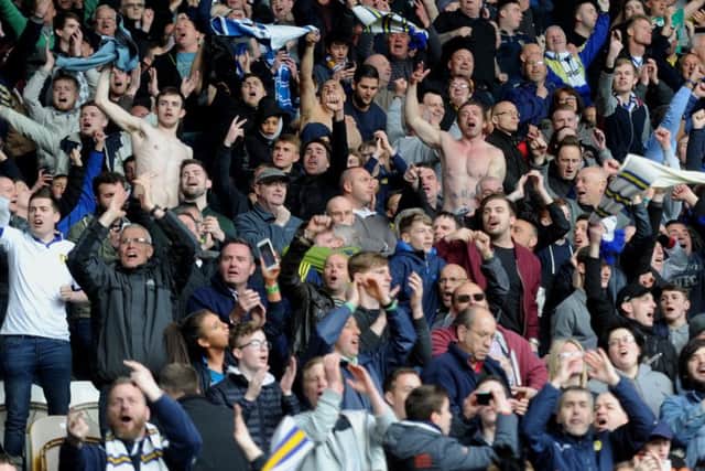 Leeds United fans celebrate Stuart Dallas' goal.