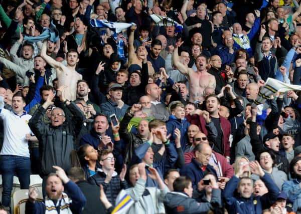 Leeds United fans celebrate Stuart Dallas' goal.
