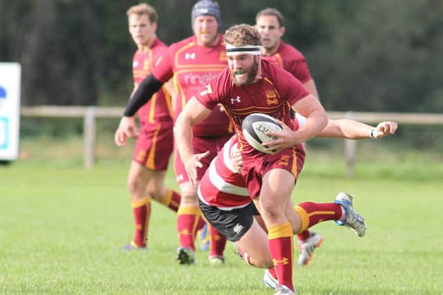 Sandal tryscorer James Briscoe.
