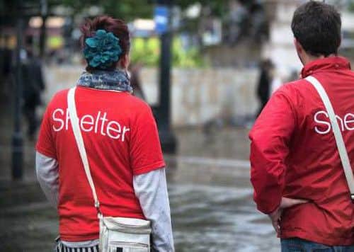 Shelter charity workers trading on the streets of Manchester as calls grow for new laws against chuggers.