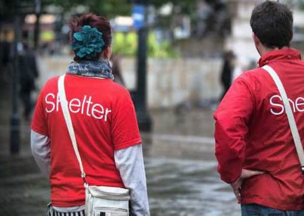 Shelter charity workers trading on the streets of Manchester as calls grow for new laws against chuggers.
