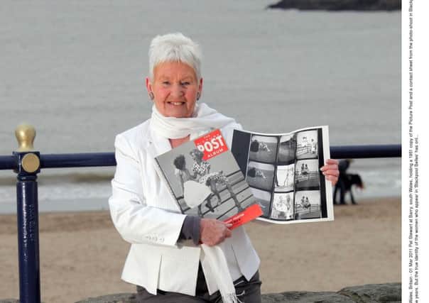 Mandatory Credit: Photo by REX/Shutterstock (1293142j) Pat Stewart at Barry, south Wales, holding a 1951 copy of the Picture Post and a contact sheet from the photo-shoot in Blackpool by Bert Hardy Pat Wilson who claims she is one of two women photographed by Bert Hardy in Blackpool in July 1951, Llantwit Major, South Wales, Britain - 01 Mar 2011 It is an iconic picture symbolising life in post-war Britain that has been used on countless postcards and posters over the years. But the true identity of the women who appear in 'Blackpool Belles' has only just been cleared up. 77-year-old Pat Stewart has stepped forward to say that she is the girl in the spotty dress, pictured in 1951 sitting with a friend on railings at Blackpool beach. Her declaration comes a number of years after a different woman first claimed to be the 17-year-old in the photo. The image in question was shot by photographer Bert Hardy who, according to Pat, approached her and friend Wendy Clarke after seeing them perform with a dance troupe.