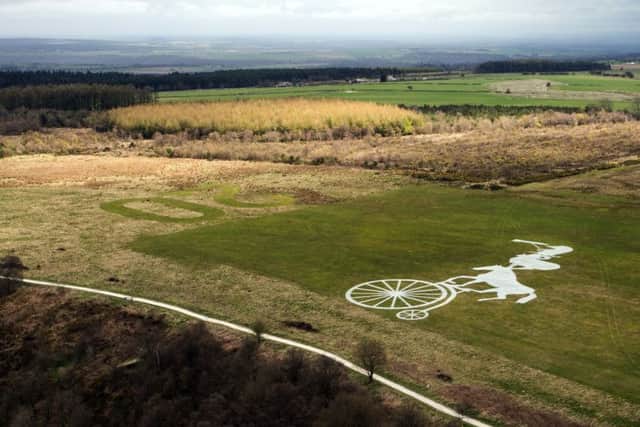 The North York Moors National Park Authoritys giant land art to mark Stage Three of this years Tour de Yorkshire cycle race on May 1 has been unveiled on the top of Sutton Bank.
