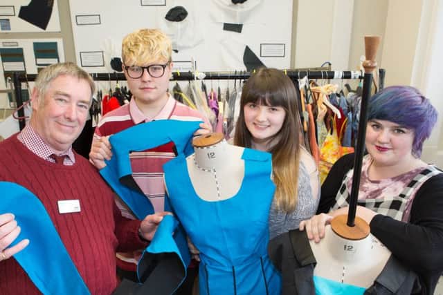 John Warburton of St Leonards Hospice, with York College students Joe Welby, Millie Paver and Shannon Lickers as they begin work on a project creating garments which will be showcased on the catwalk at this summer's Great Yorkshire Show.