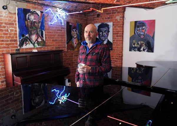 Leeds artist Mik Artistik, best known for his portraits of people on paper bags, is holding an exhibition of his oil paintings at Besbrode Pianos in Holbeck.