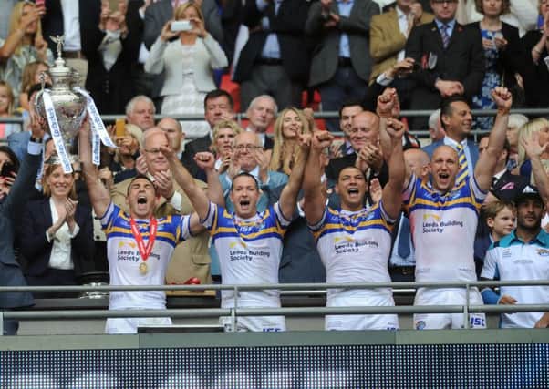 Leeds Rhinos lift the Challenge Cup last year.