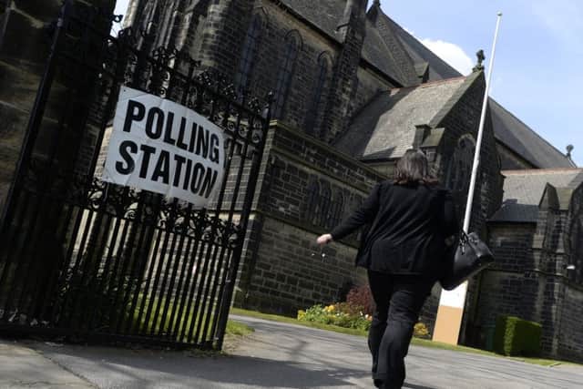 A voter at the polling station at St Margarets Parish Church, Horsforth yesterday.