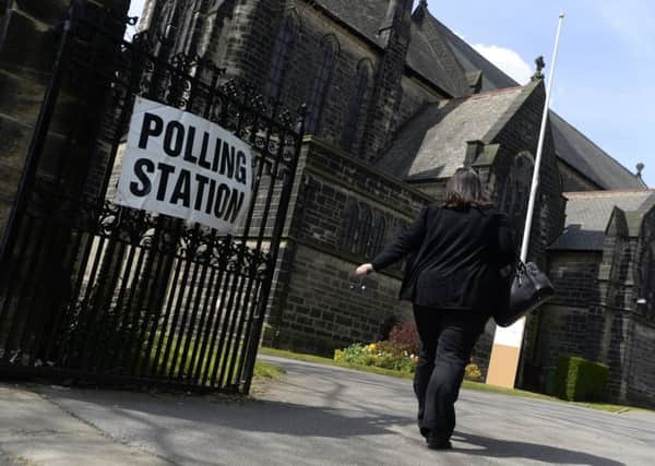 A voter at the polling station at St Margarets Parish Church, Horsforth yesterday.