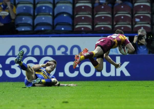 Ryan Brierley dives over for the Giants' third try.  (Picture: Bruce Rollinson)