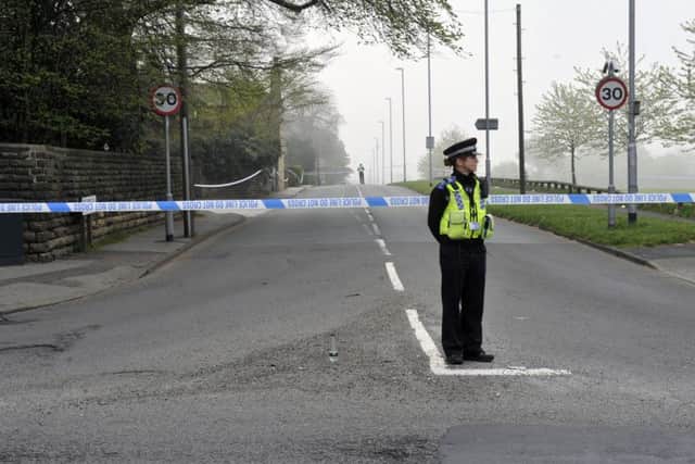 A police cordon in place on Potternewton Lane yesterday morning. Picture: Steve Riding.