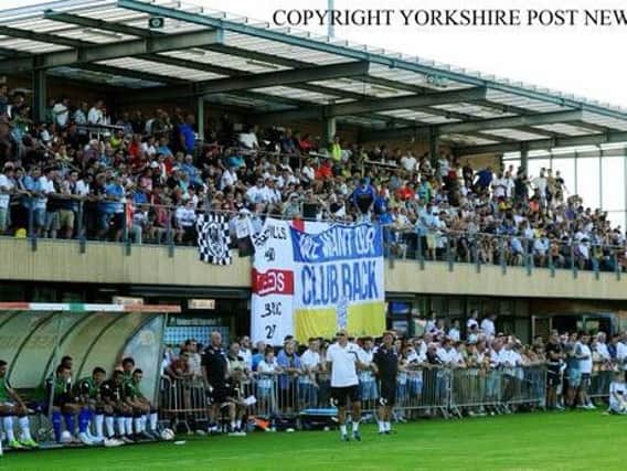 Leeds Fans United flag at a pre-season game in Austria last summer.
